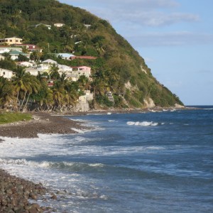 The much rougher Atlantic side of Scotts Head. Ours is the long red roof closest to the edge.