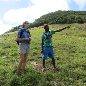 We hired KG to take us hiking one day. He had to clear the trail with his machete, he did the whole thing in slippers, and filled his little camelbak with the water of two green coconuts before we hit the trail.