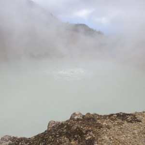 Boiling Lake with a view of the erupting bubbles in the middle