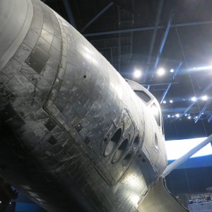 Atlantis space shuttle, now on display at the Kennedy Space Center with the bay doors open. In this picture, you can see the black panels of heat shields. This shuttle completed 33 missions over 26 years, transported 207 astronauts, spent 307 days in space, and flew 126 million miles  before it retired to the museum in 2011.