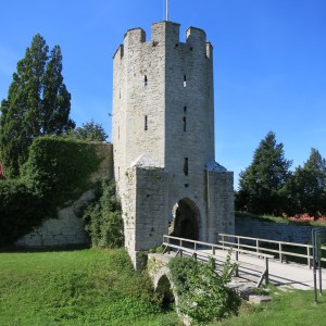 One of the tower entrances to Visby, Gotland. While there is not a traditional moat around the town, there is a low wet area. The wooden planks that make up this bridge would be removed when the town was expecting intruders.