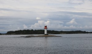 One of the many small lighthouses that help sailors navigate safely. Note the swans in front of it for scale. Swans and large signets are all over the place right now.