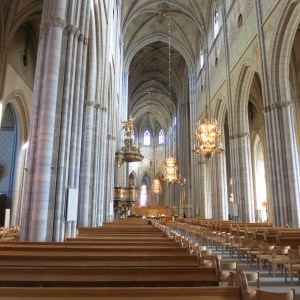 Uppsala Cathedral, looking nearly the length of it. Note the elaborate gold pulpit in the middle.