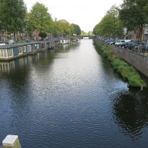 One of the many canals. Note the house boats on the left and the floating herb gardens on the right. We never saw anyone tending or harvesting the herbs but they were a common sight.
