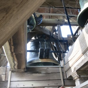 Carillon in the Belfort. See how the clapper has been pulled to the side and each bell has a couple of exterior hammers.