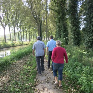 Peter, Jim, and Mieke walking on the outskirts of Damme.