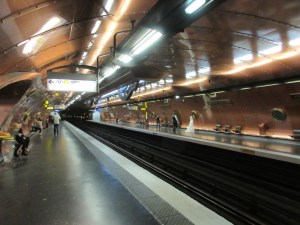 This subway stop is modeled after a Jules Verne submarine. Note the wedding photo shoot on the opposite platform.