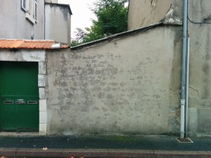 The blank shed wall next to Jim's old house which the communist party used to whitewash with "Yanqui go home." 2014