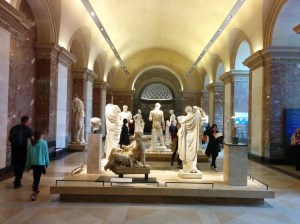 A room of Greek sculptures in the Louvre.