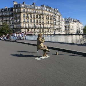 This street performer challenges Newtonian physics.