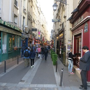 A busy street in the Latin Quarter. By "Latin," they don't mean Hispanic but actually the dead language Latin because the area was full of academic nerds back in the day, speaking Latin!