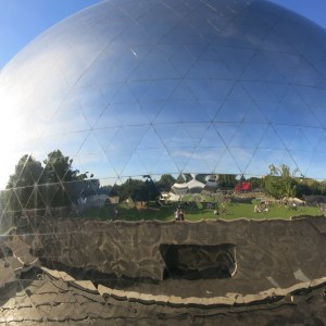 Megan's favorite public art: La Géode. Can you see us waving at you?
