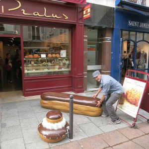 Jim picking up some pastries at a local patisserie. Does that really say 'Saint James' in the upper right?