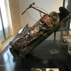 At the French Military Museum, we saw this in the WWII exhibit. It is a 'Welbike' folding motorcycle in its parachute-drop container. Stamped on the engine cover was 'Villiers Junior.'