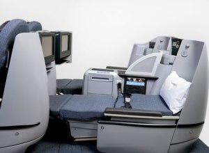 Deluxe first-class seats, folded into beds for the night.