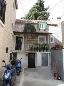 This is our house in Split. You enter through the green door on the left and immediately head upstairs.