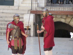 "Roman soldiers" in the main square  pose for tips. 