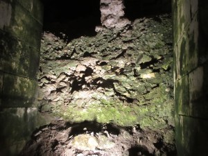 A wall of detritus in the cellars, yet to be excavated by archeologists. The passage in the foreground was excavated in the last 50 years, as was 90% of the cellars.