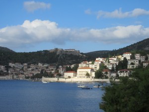 Hvar town with the Venetian fortress perched on top of the hill. Note the old town wall running straight uphill to the fort.