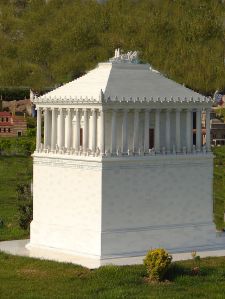 A scale model of what the Mausoleum probably looked like when it was built around 350BC. A wheel from the chariot on the roof was found; its diameter is over 6 feet.