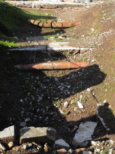 Under the roadways, these pipes carried in clean water and carried out sewage.