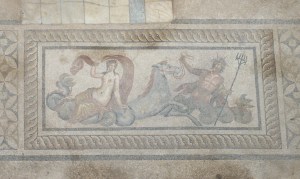 Floor mosaic of a woman riding a hippocampus, mythical Roman beast, and a god.