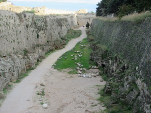 The Rhodes moat. These granite balls were fired from mortars  short-range out of the moat at encroaching attackers.