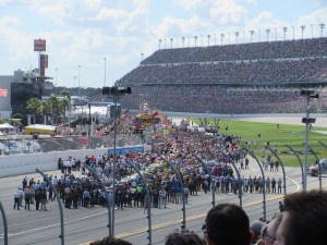 All the cars, teams, sponsors, and crews lined up before the race begins.